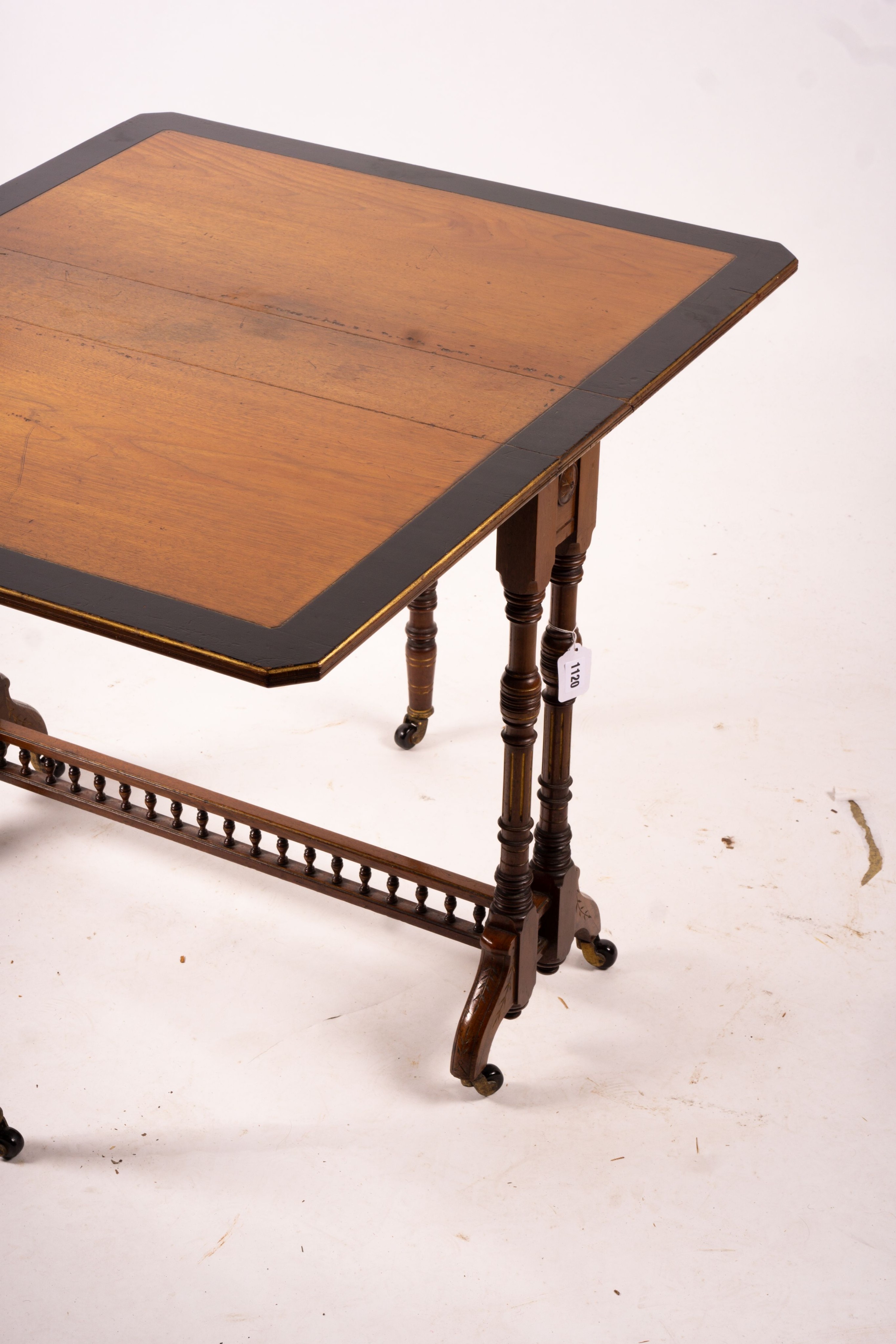 A late Victorian part ebonised walnut Sutherland table, width 76cm, depth 15cm, height 65cm